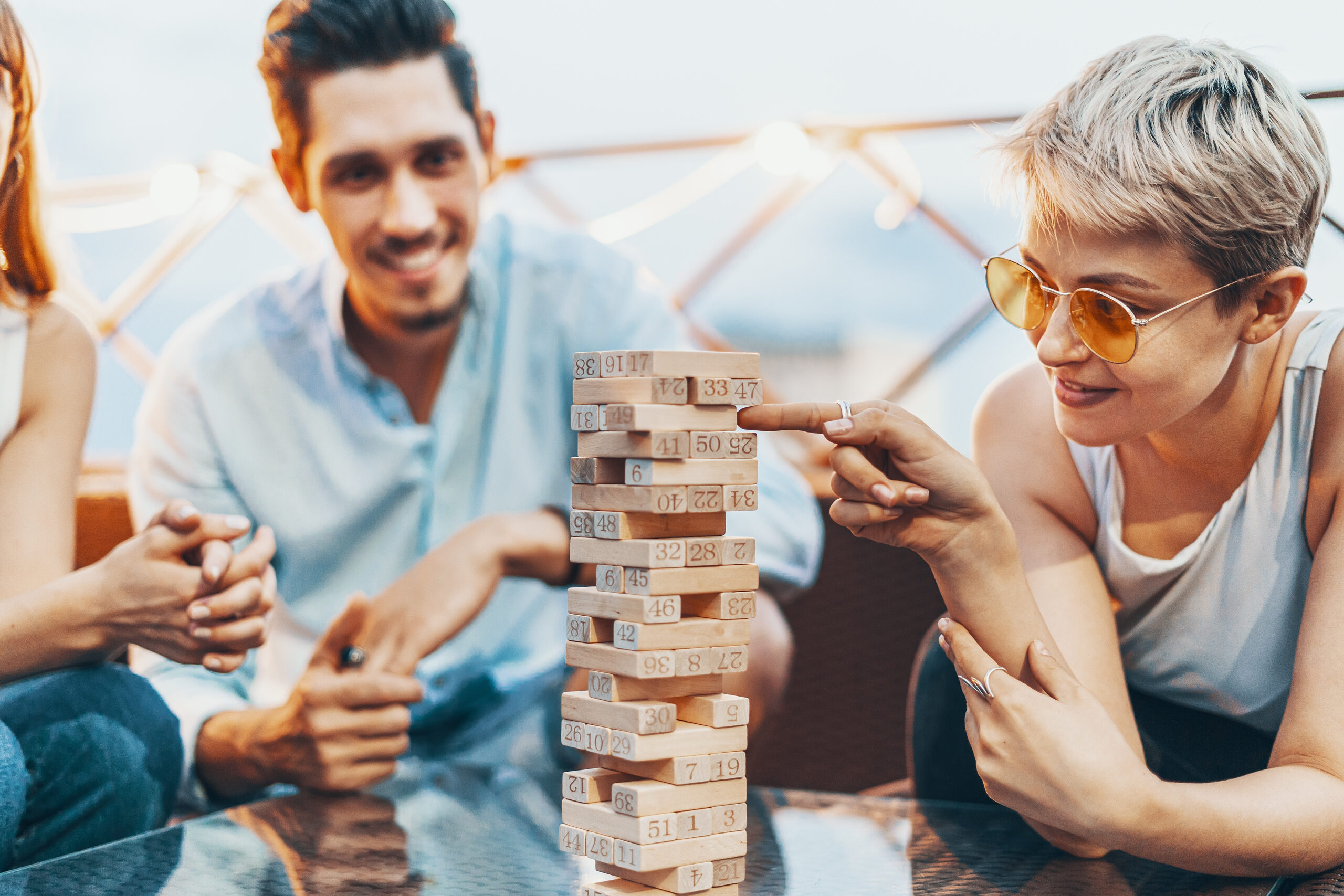 company-young-people-playing-board-game-scaled